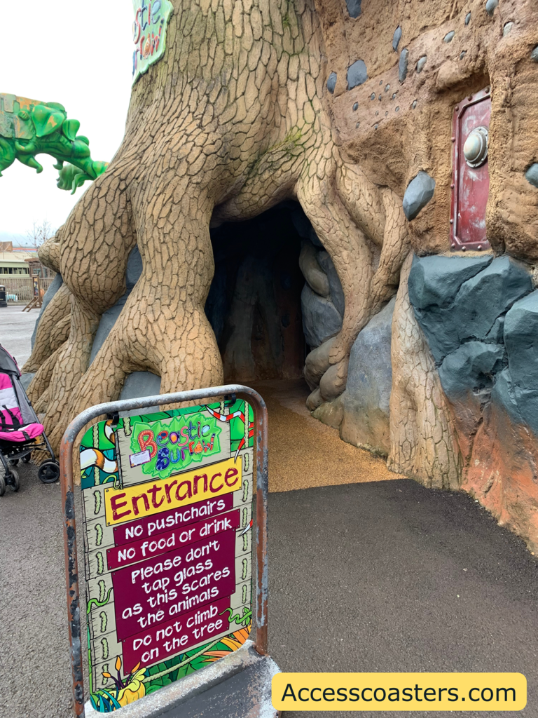 Image of Beasty Burrows entrance. the entrance looks like a tree trunk.