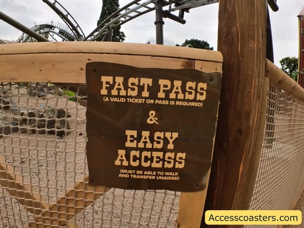 image of sign that reads: fast pass (a valid ticket or pass is required) easy access must be able to walk and transfer unaided 