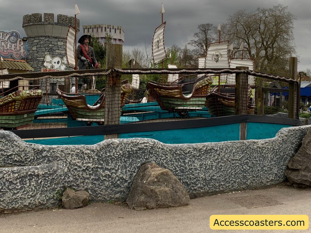 Image of the Jolly Buccaneer ride you can see mini pirate ships going around in a cercal 