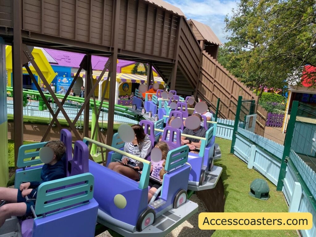 image of bluey the ride on the break run under the exit bridge multiple rows are visible all themed towards a children ride on car.