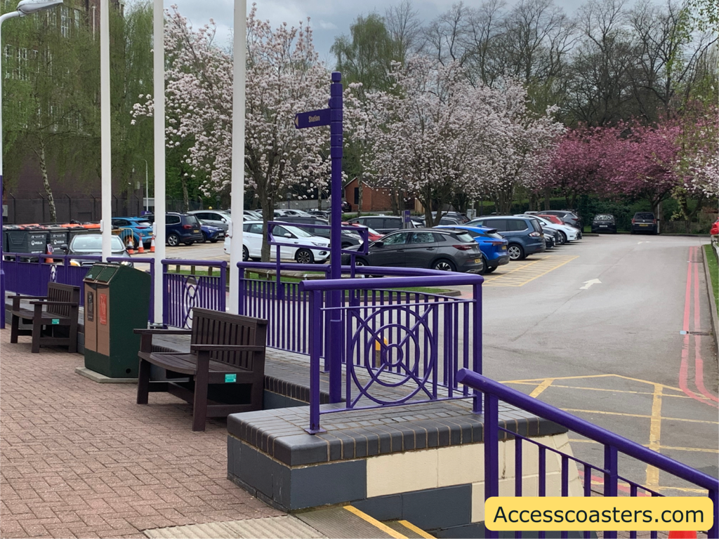 Image shows a view of the blue badge parking from the entrance of Cadbury World