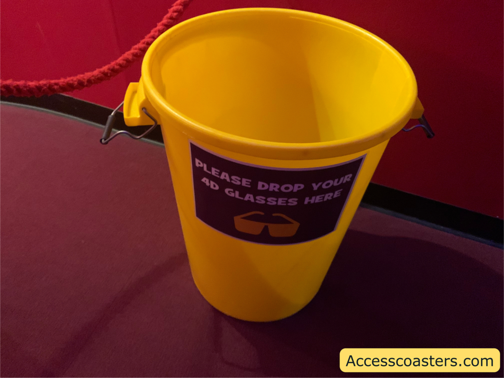 Image of yellow bucket where you put your 3D glasses