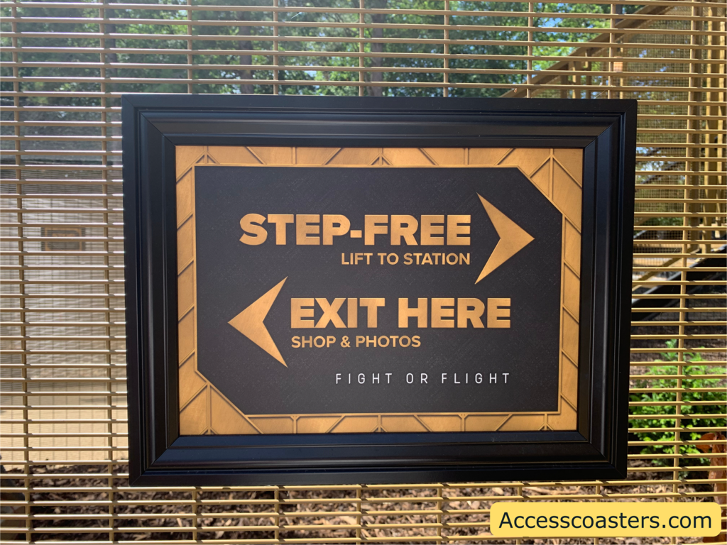 Image of sign step free access right pointing arrow exit here left pointing arrow 