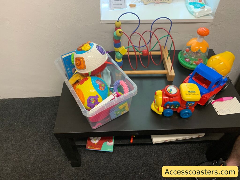 image of a table with childrens toys and games on 