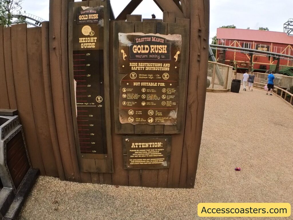 image shows gold rush ride restriction board and hight board