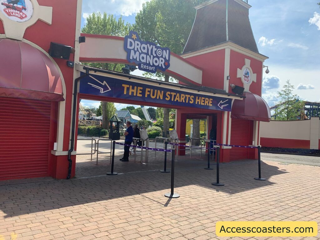 Image shows turnstiles at drayton manor main entrance with 4 queue lines set up 