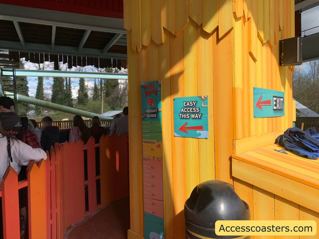 image of easy access queue line for river rapids. In the image you can see signs that see easy access this way. 