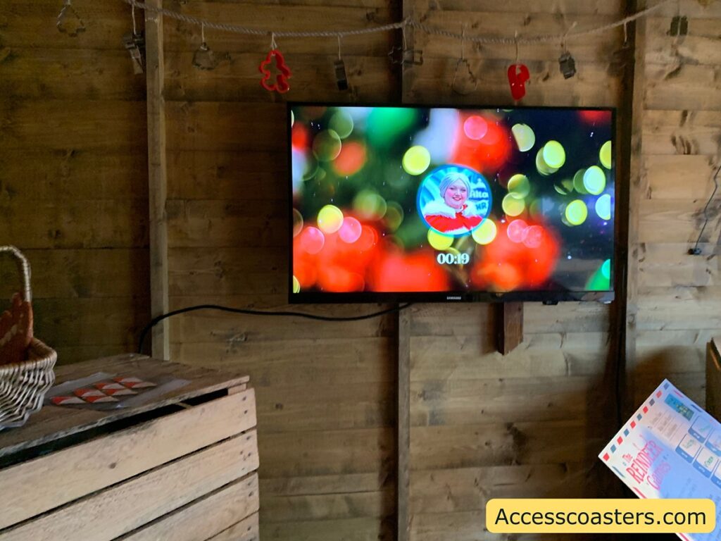 in this image you can see a tv screen playing a video message from more cluse who camera is turned off.