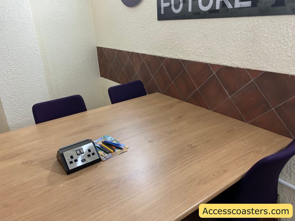 image shows table wish charging points