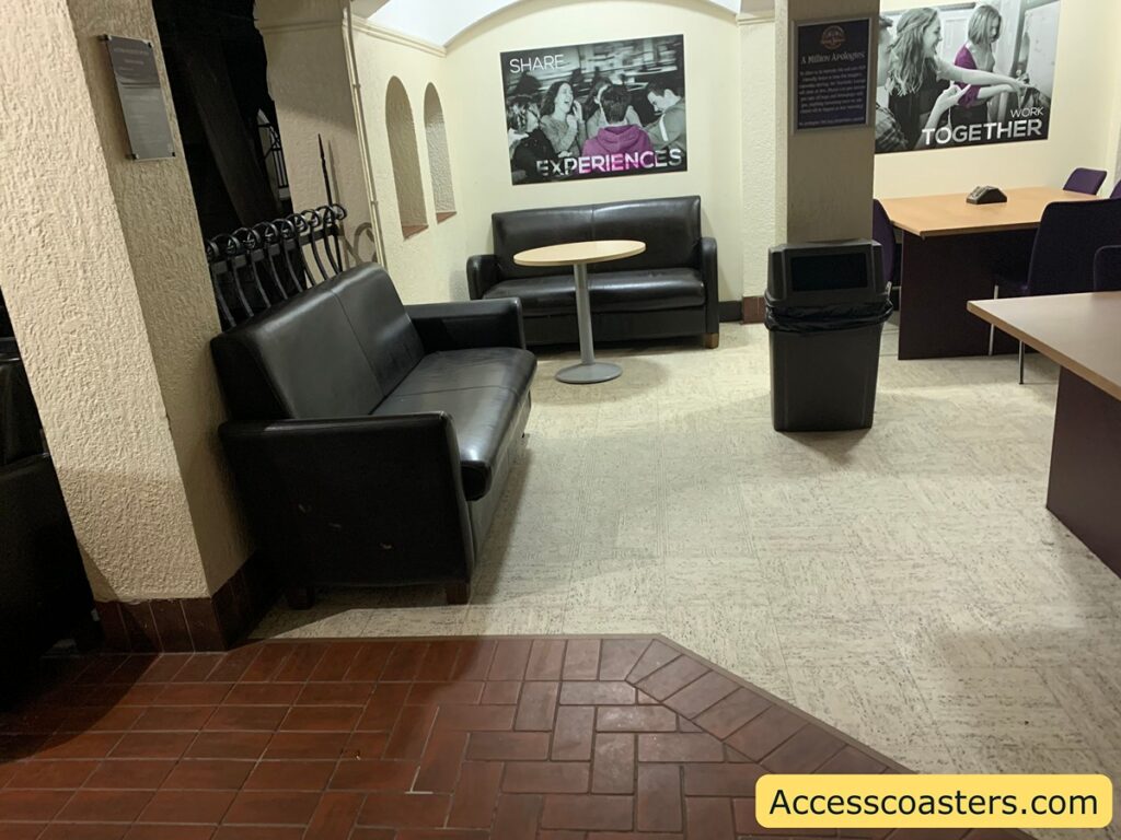 image shows spared out sofa and tables