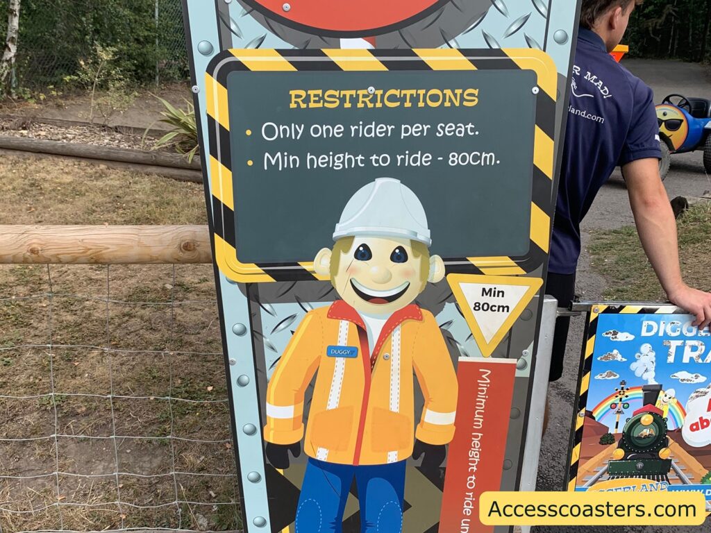 ride restrction sign for trian ride. the sign reads RESTRICTIONS
- Only one rider per seat.
- Min height to ride - 80cm.
It also repeats "Min 80cm" inside a yellow triangle.