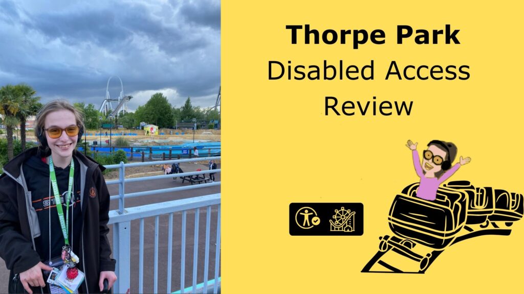 A smiling Iona with light brown hair, orange-tinted glasses, and headphones, wearing a dark jacket and an access lanyard, stands in front of a railing at Thorpe Park with the Stealth roller coaster in the background under a cloudy sky. Beside her is a yellow graphic with bold text reading "Thorpe Park Disabled Access Review," along with cartoon icons for accessibility and a roller coaster.