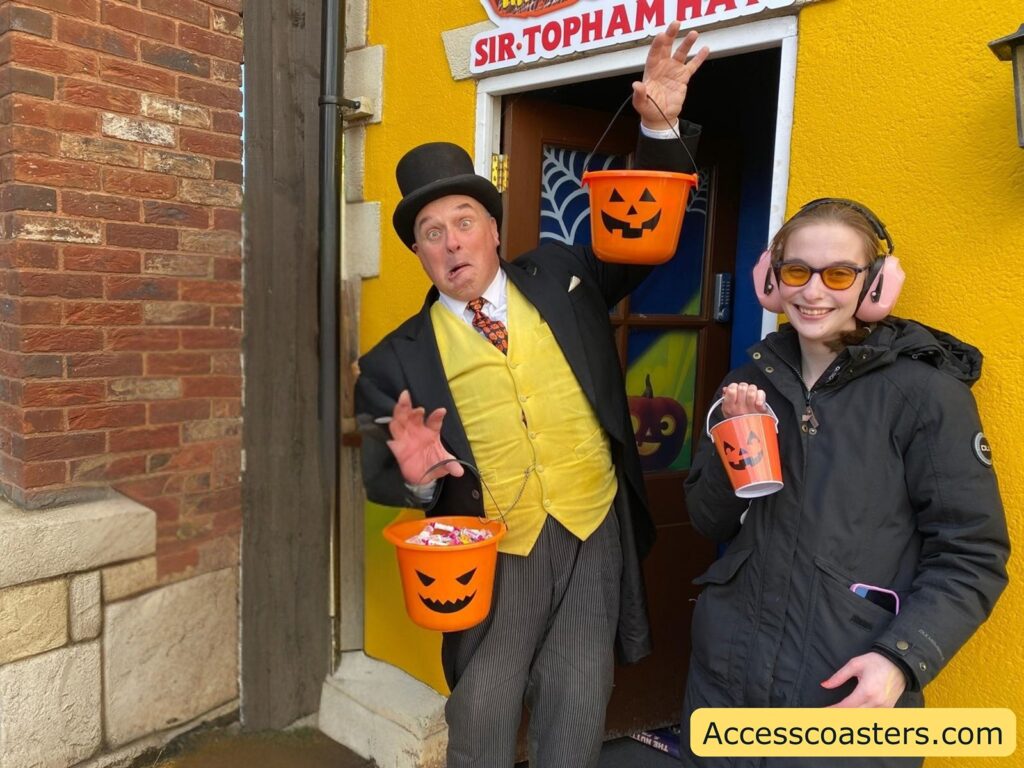 Iona posing with Sir Topham hat holding trick or treat bucket 