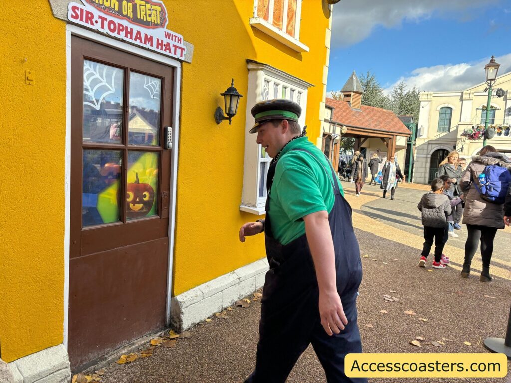 Dusty outside the yellow house at Thomas Land 