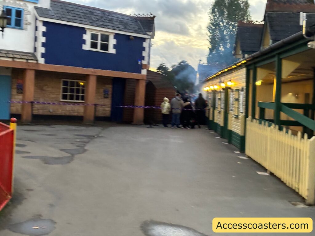 people queueing by the haunted exprece station