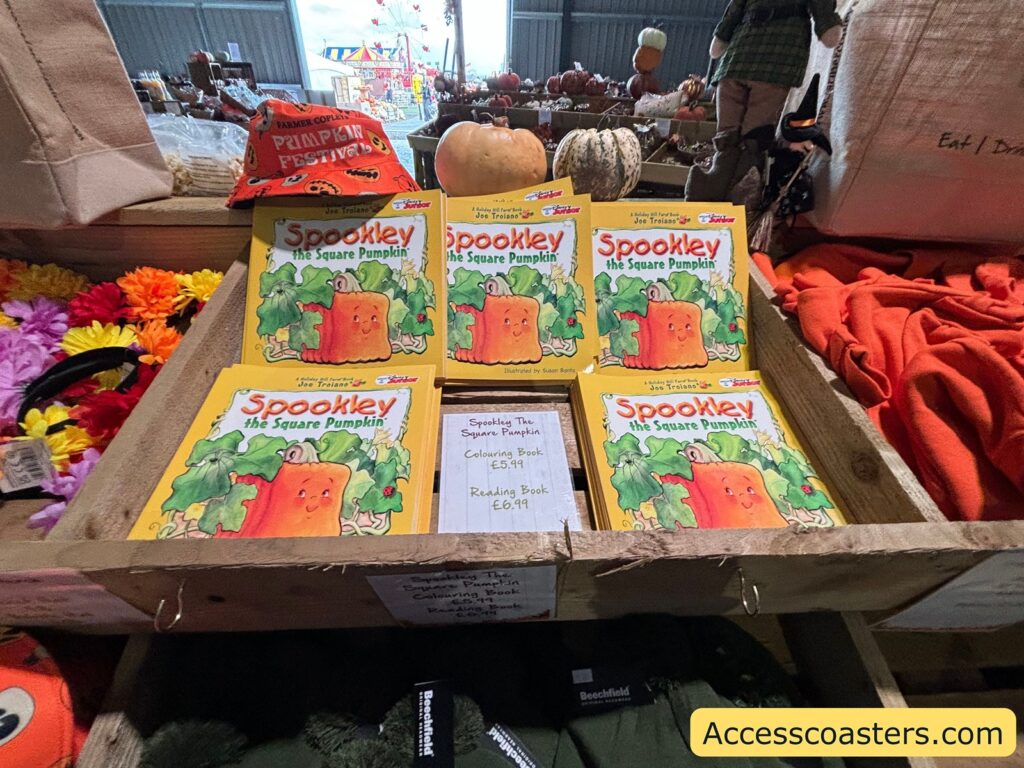 Spooky" pumpkin festival activity books displayed in a basket.
