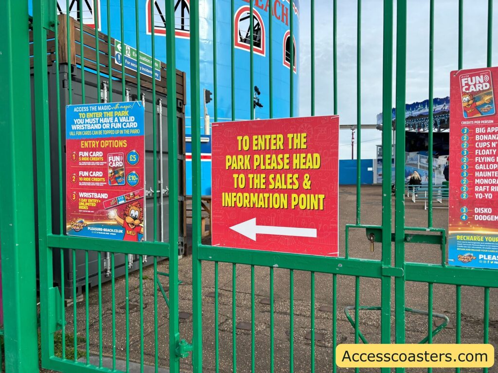 gate to Great Yarmouth Pleasure Beach with a clear sign directing visitors to the sales and information point