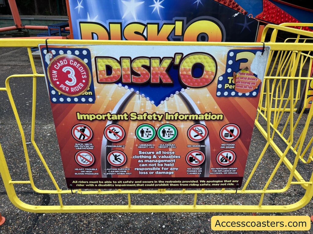 safety information board for the Disko ride, showing ride rules, warnings, and a 1.2 meter height restriction at the ride entrance.