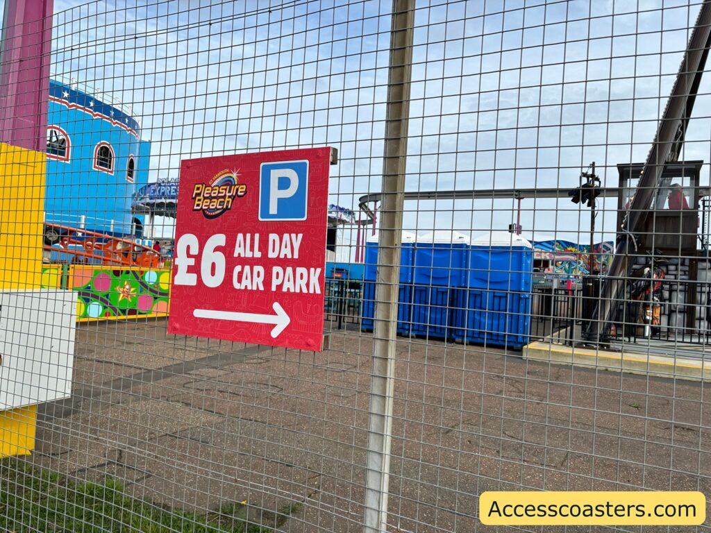 Sign on a fence at the Pleasure Beach car park stating “£6 all day car park,” 