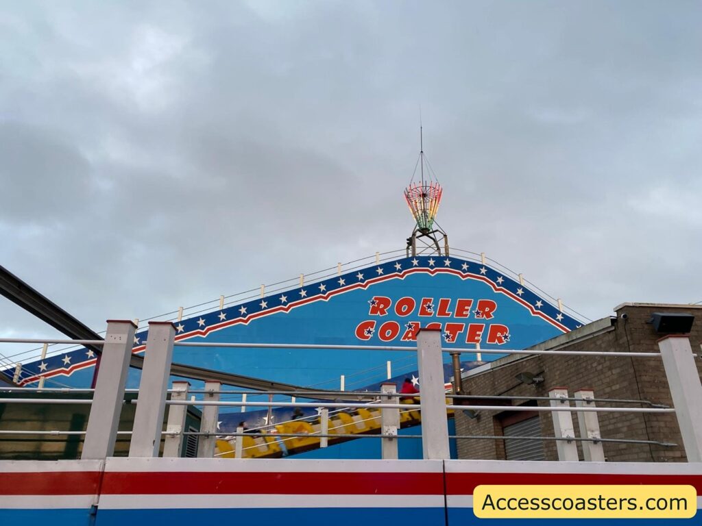 View of the Roller Coaster entrance with the “Roller Coaster” sign above 