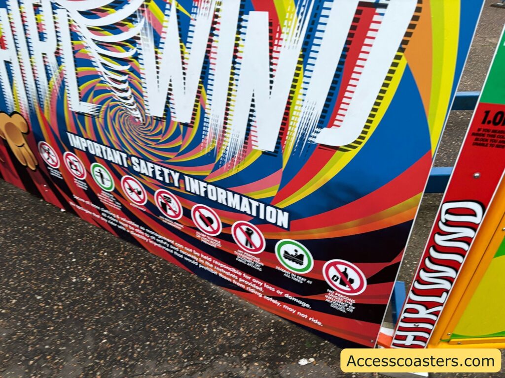 "Whirlwind" rollercoaster signage close-up, showing bright swirls and ride information