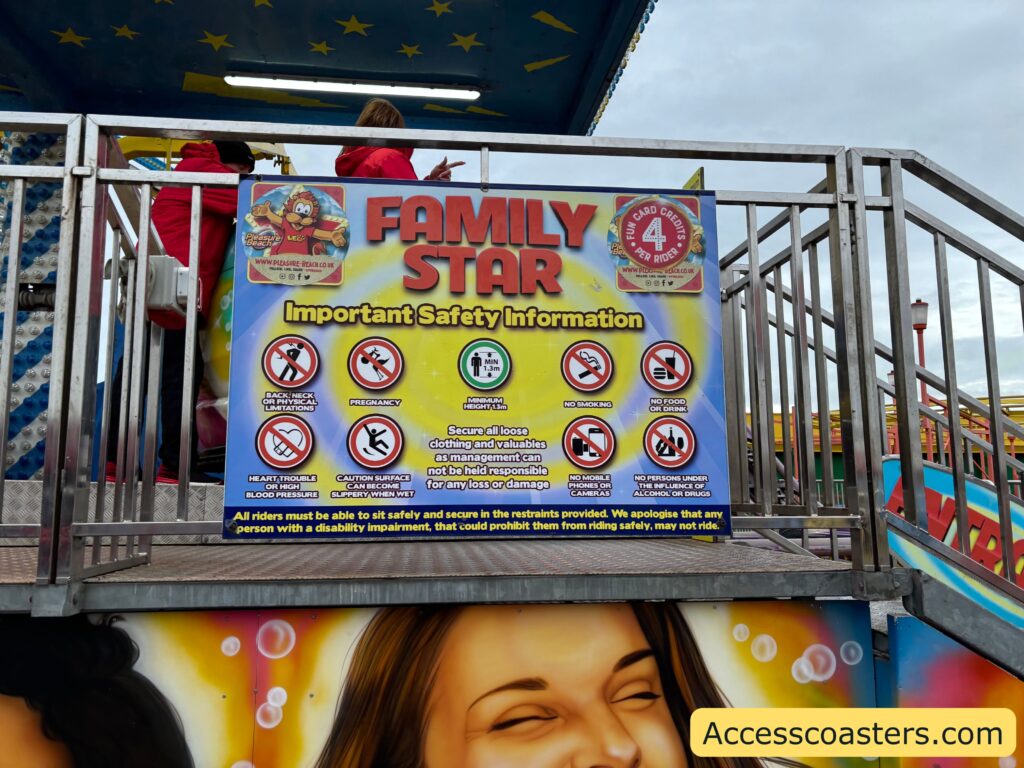 safety restriction sign detailing ride restrictions. 