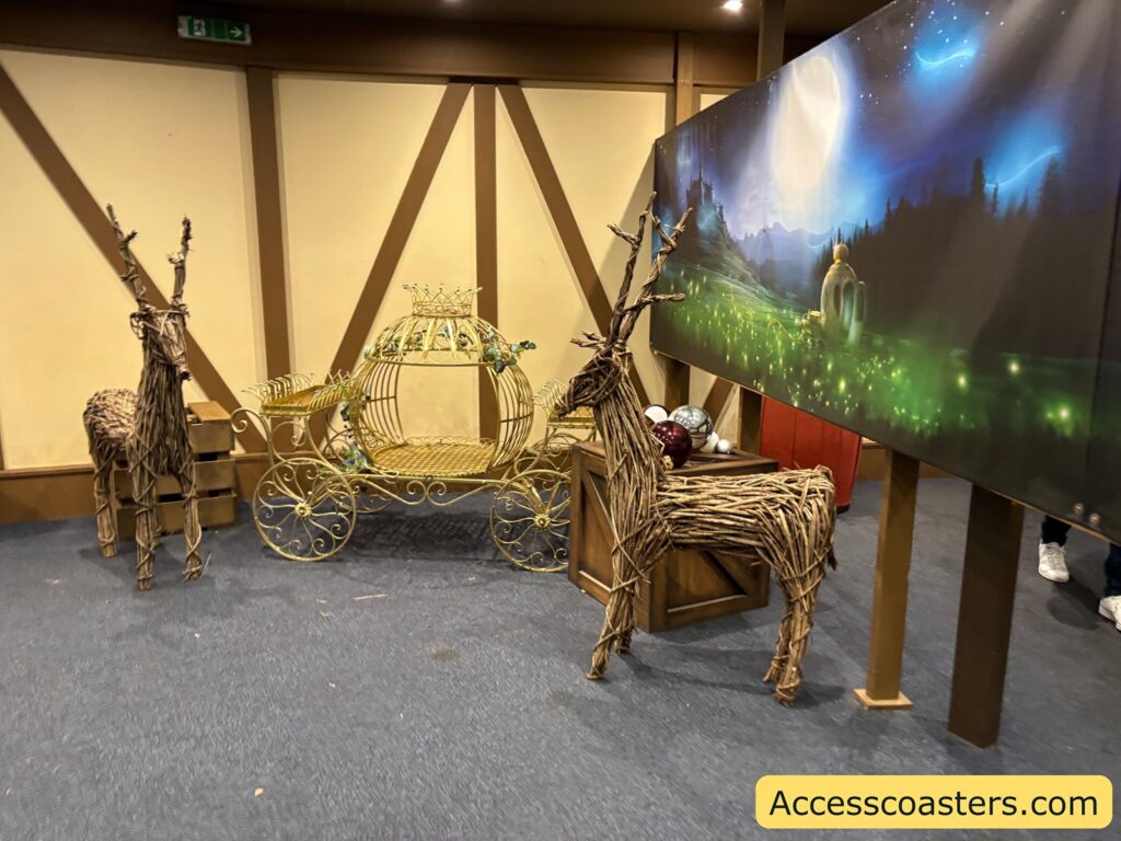  Decorative Cinderella carriage display inside the theatre, styled for children to enjoy and take photos.