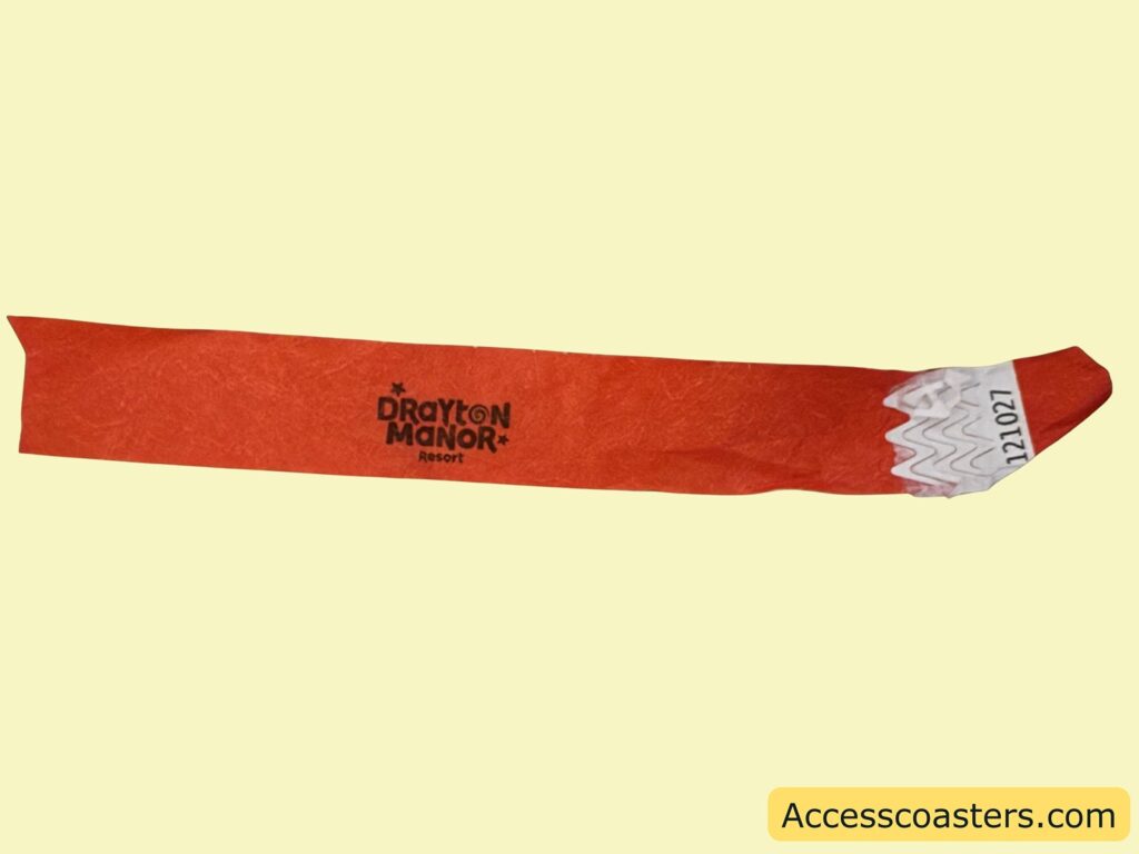  A red wristband with "Drayton Manor" branding