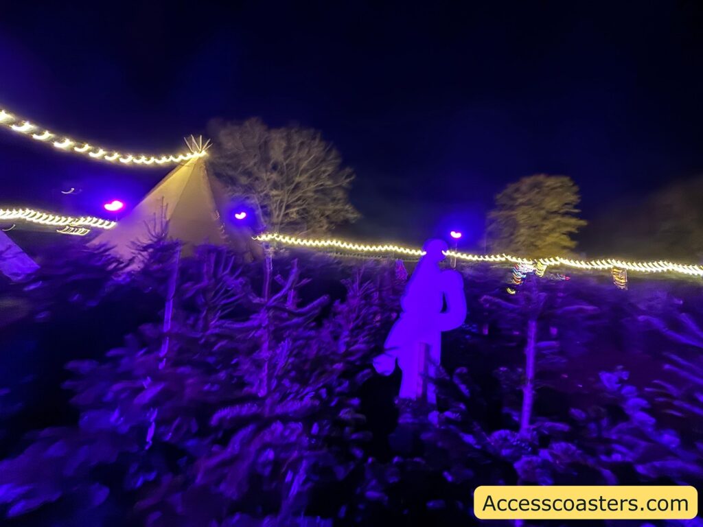 image of Christmas tree maze with cut outs of elf's 