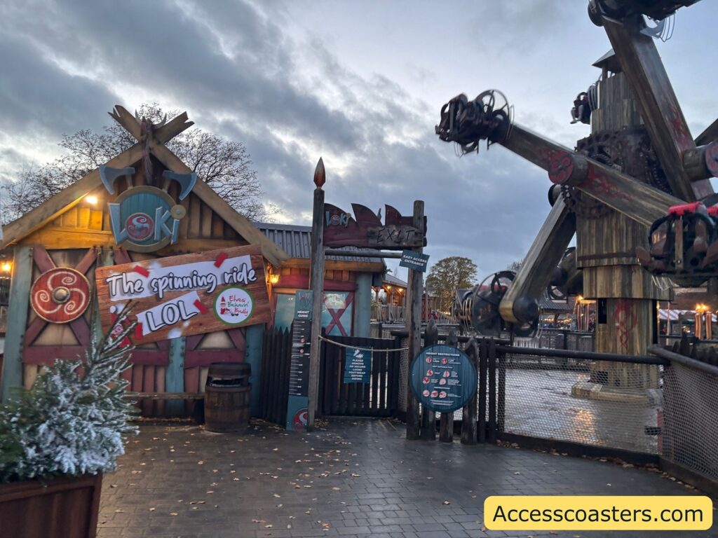 image of the entrance to Loki with a big sign that reads The spinning ride LOL There is an image of an elf on the sign