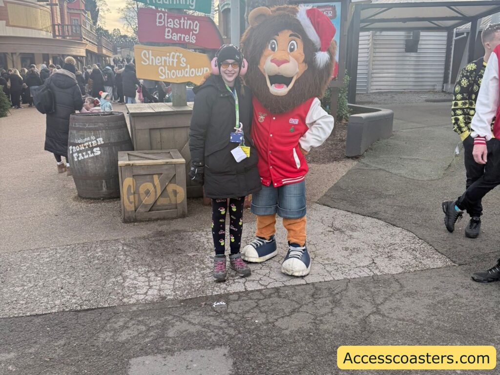 Iona and Rory having a picture. Rory is waring  in a festive Christmas outfit