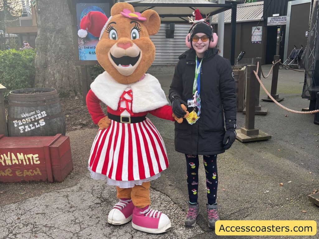Iona taking a picture with Lory in a festive Christmas outfit