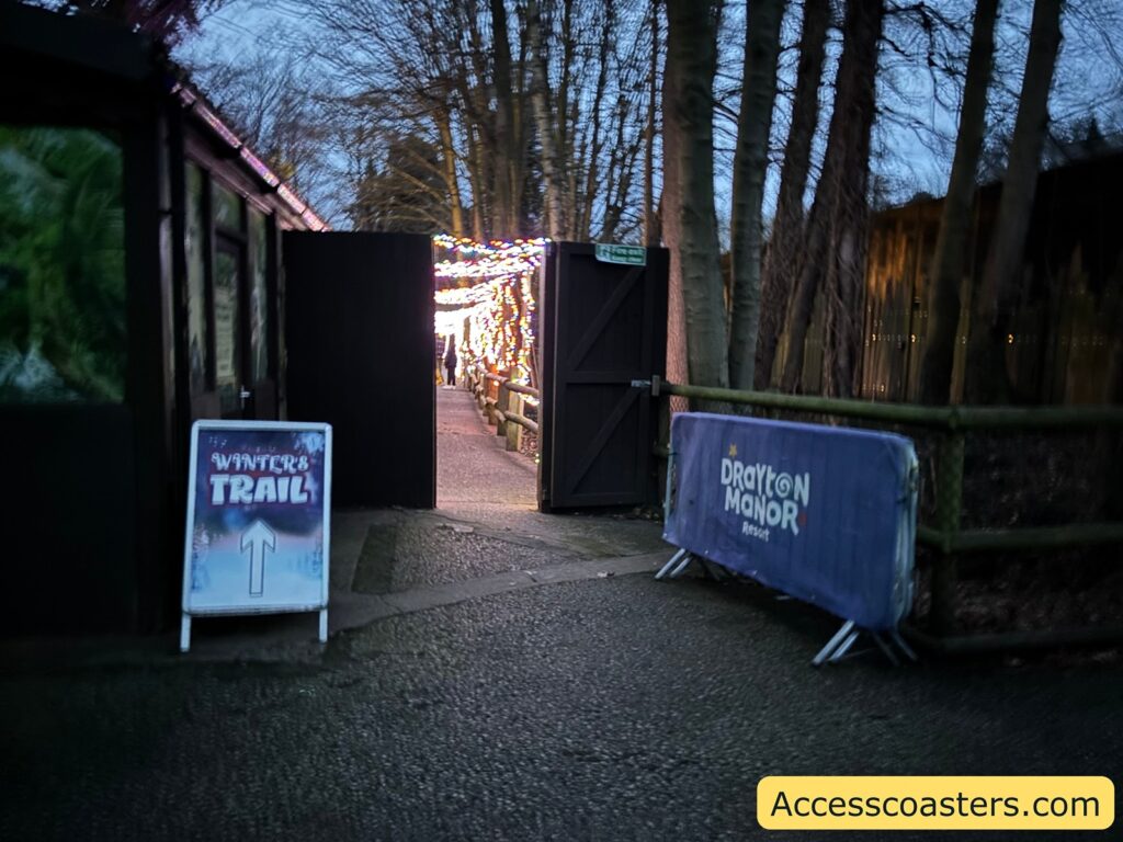 sign for the winters trail with light tunnel in the background. 