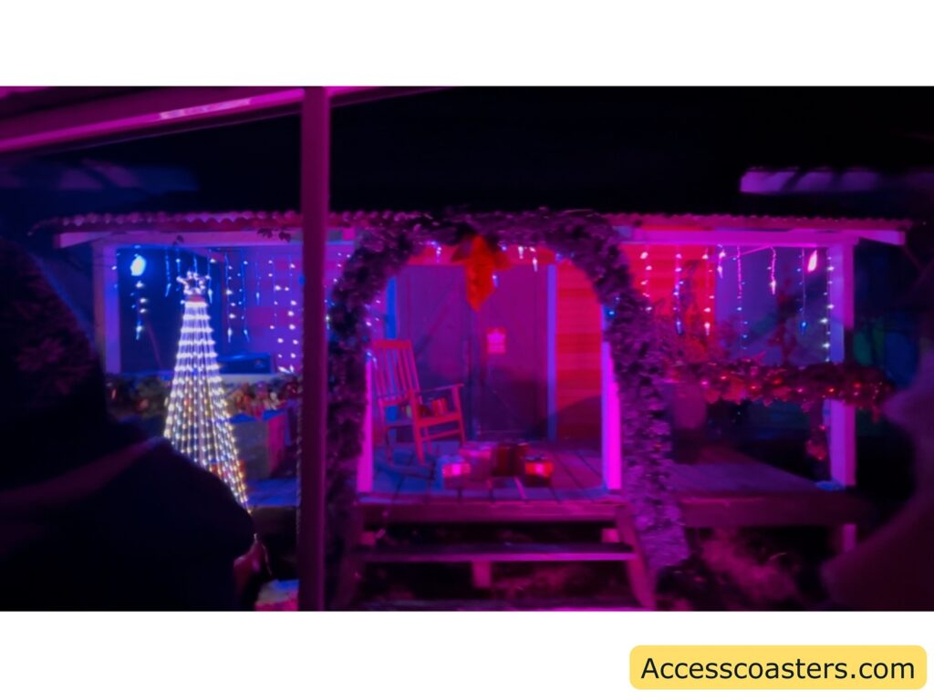 Wooden gazebo decorated with colorful Christmas lights and festive ornaments.
