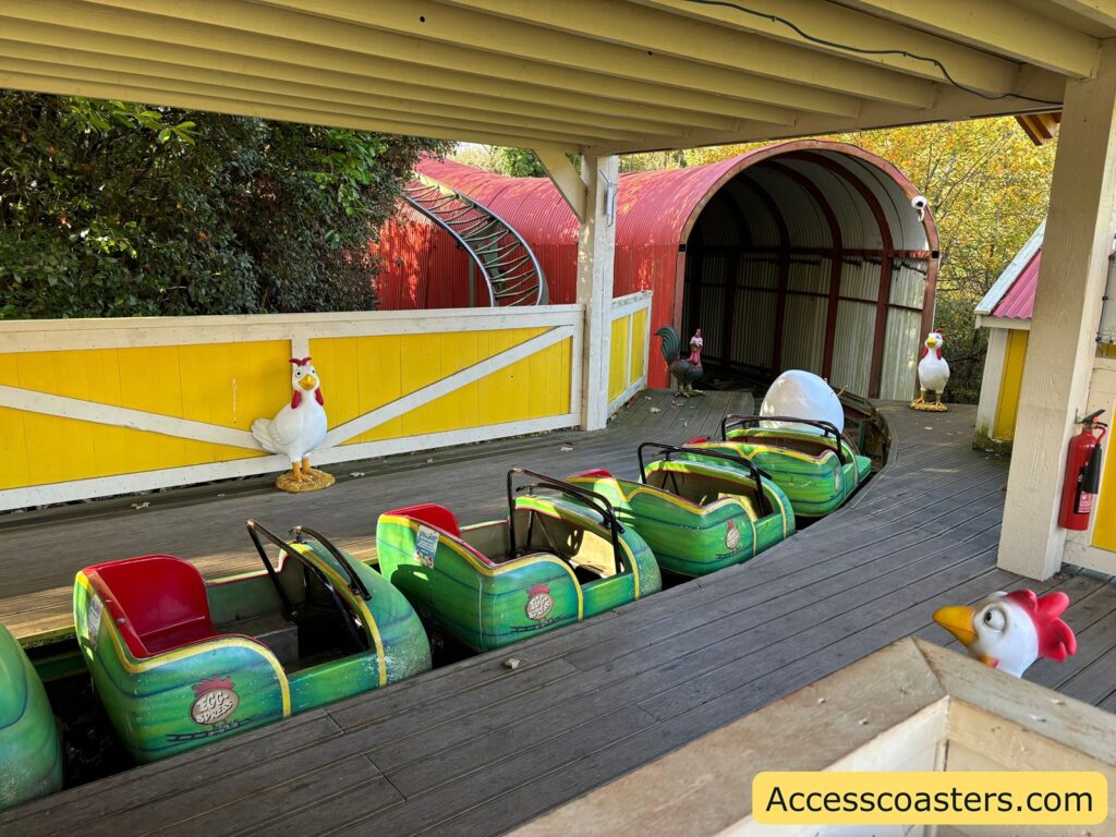 Egg Spress train with colorful carriages waiting at the station ready for passengers.