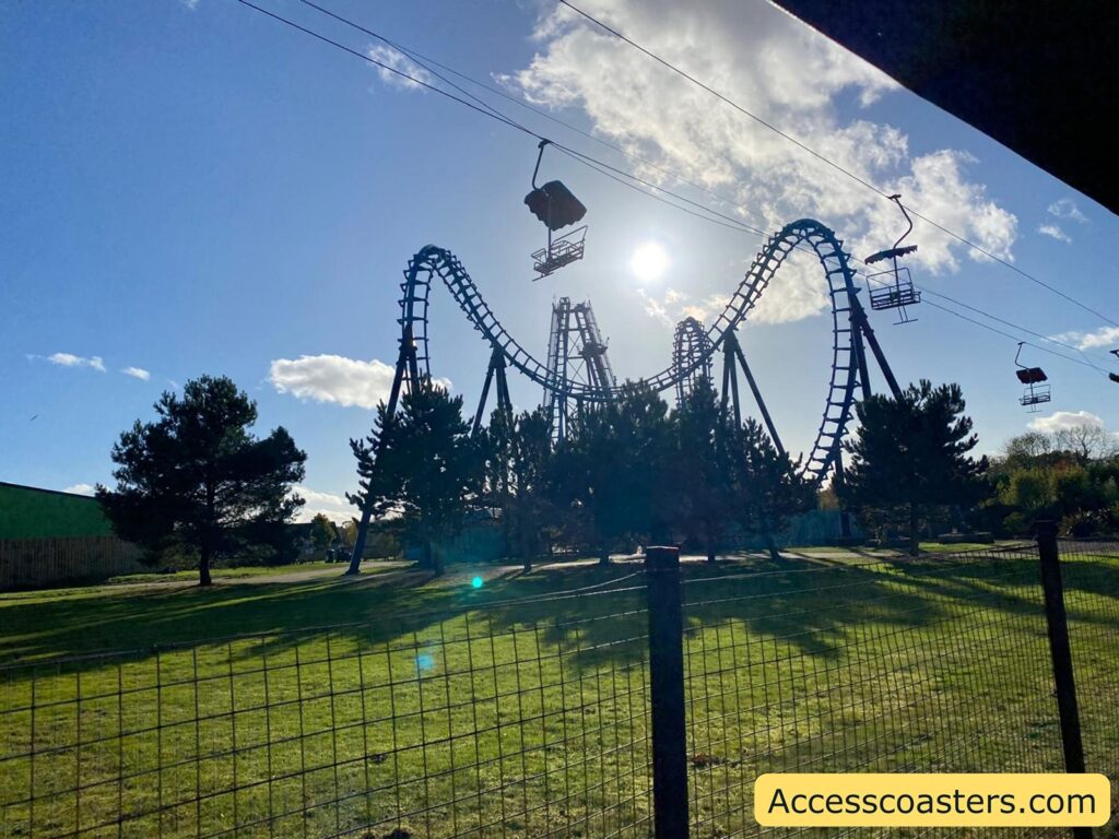 A wide view of the Wipeout roller coaster’s looping steel track 