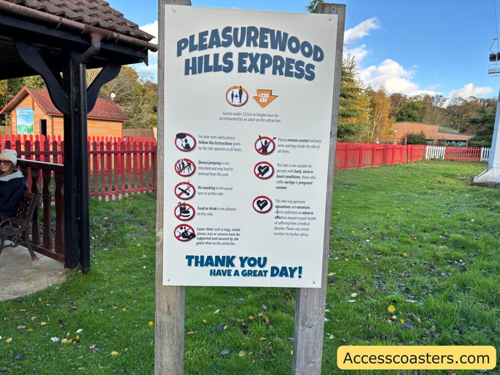 Sign for Pleasurewood Hills Express displaying ride information and safety guidelines.