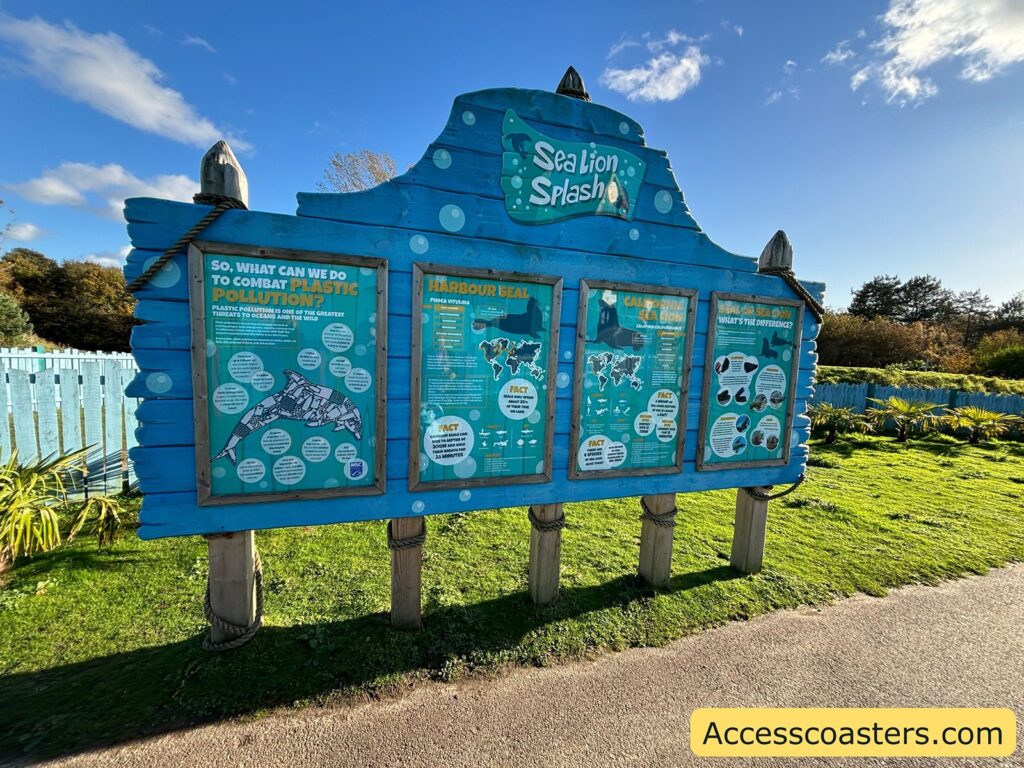 Signboard at the entrance to the Sealion Show area displaying show times and information