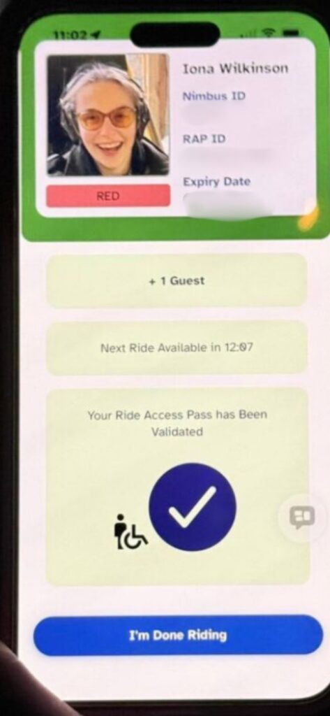 image of Screenshot of the Ride Access Pass app showing the ID card screen that appears after scanning a QR code, with an “Active Pass” card at the top (large “A” icon) and pass-holder details such as name, date of birth, expiration date, approved parks, and an “Approved” status, plus a finish ride button
