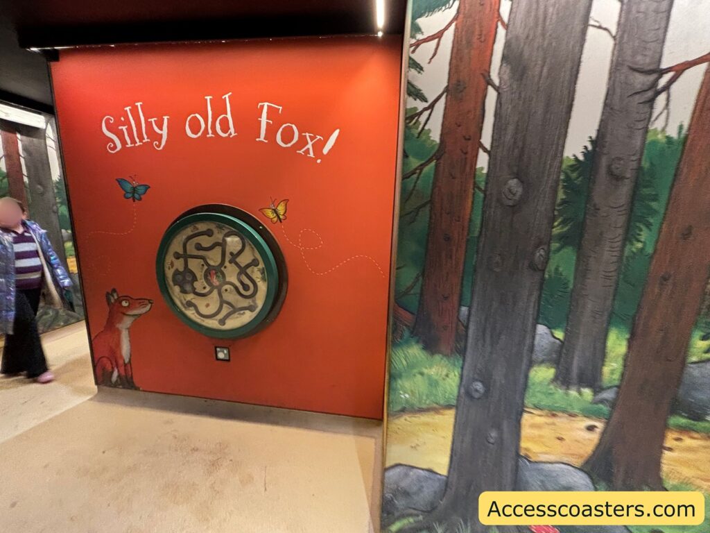 Red door/panel with the words “Silly old Fox!” in white, part of the indoor Fox-themed area.
