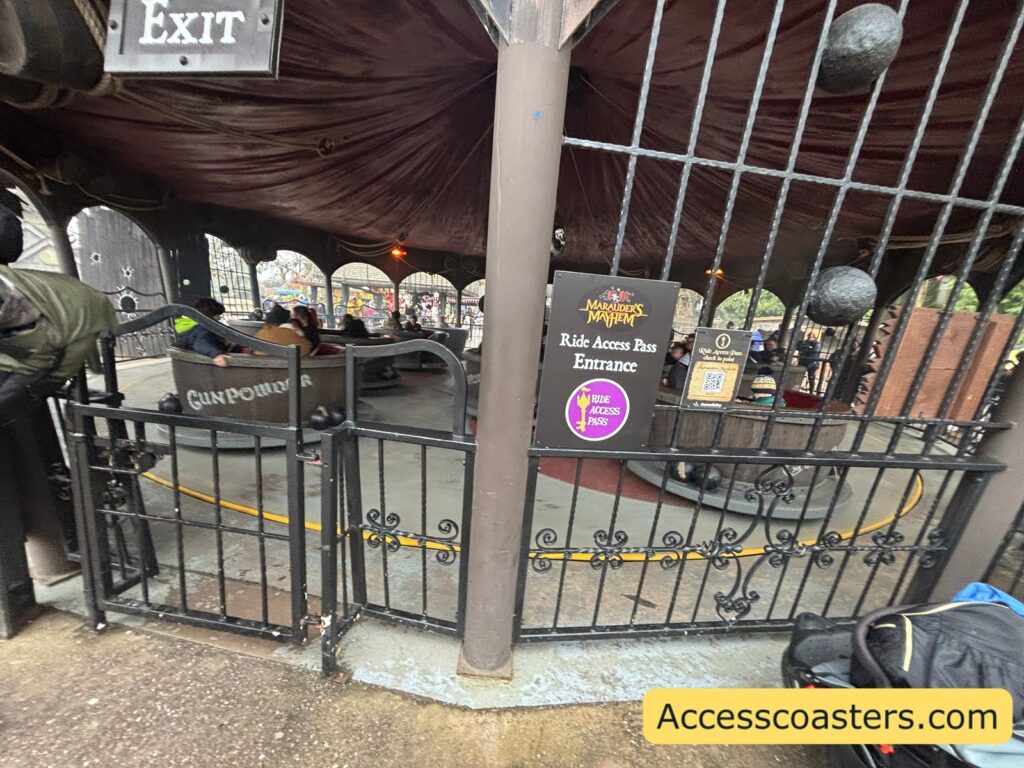 image of ride acess pass entrance sign at ride exit gate with a ride access pass qr code check in.