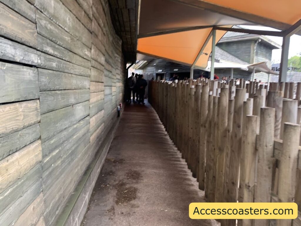 Narrow passageway in the ride access pass queue area of the Wicker Man ride.