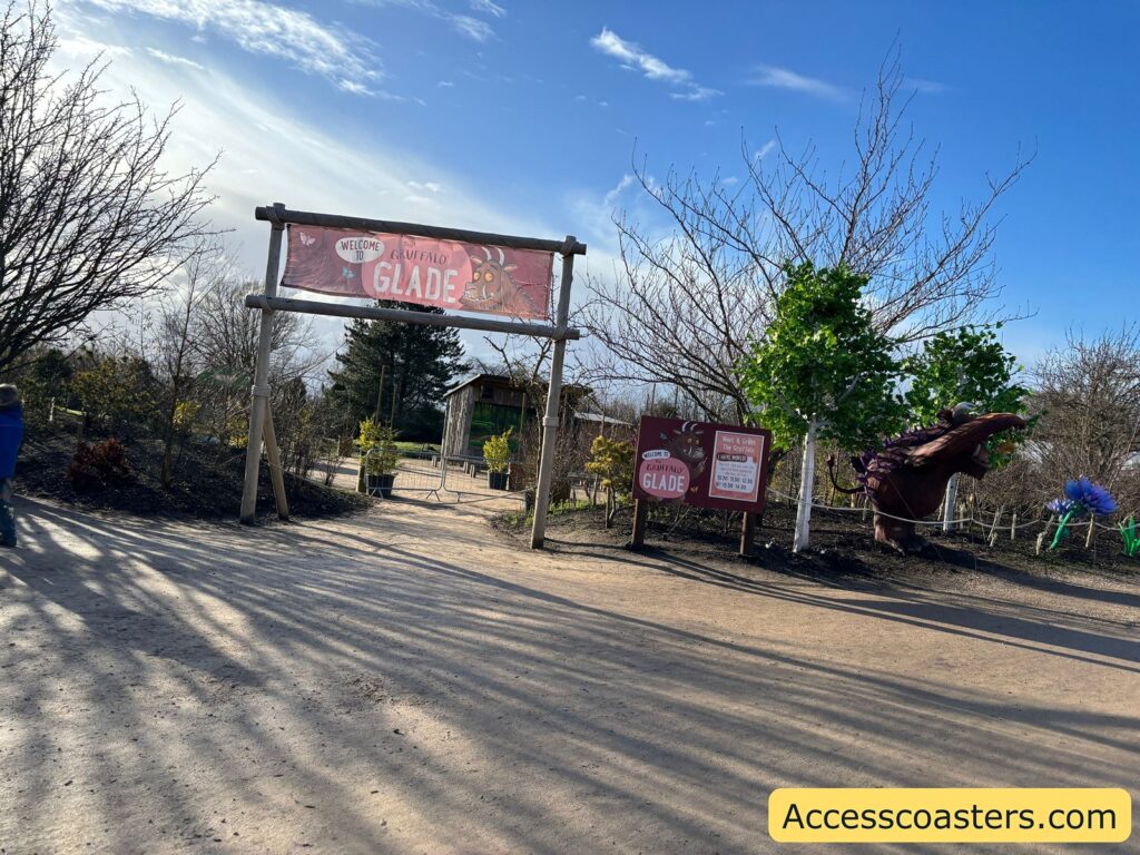 Wide path leading to the “Gruffalo Glade” entrance, with multiple signposts along the route.
