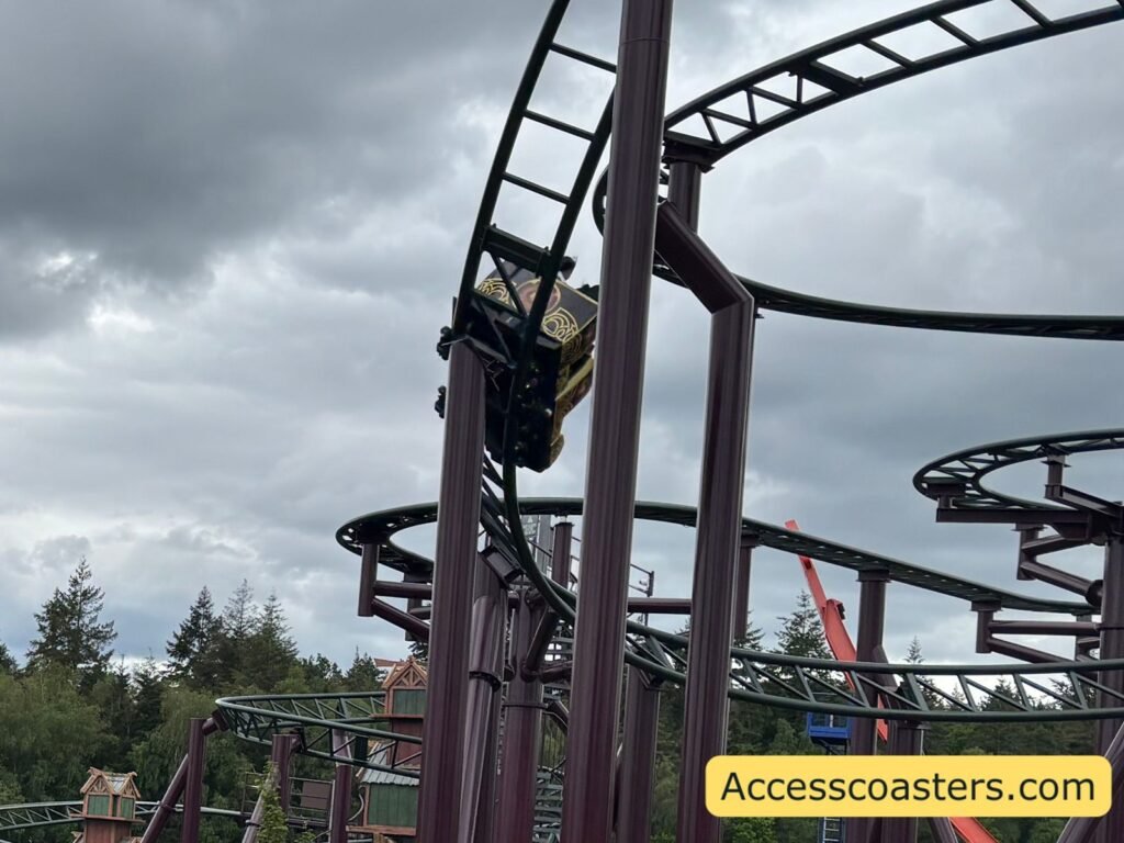 image of the back of Raven train going down the drop