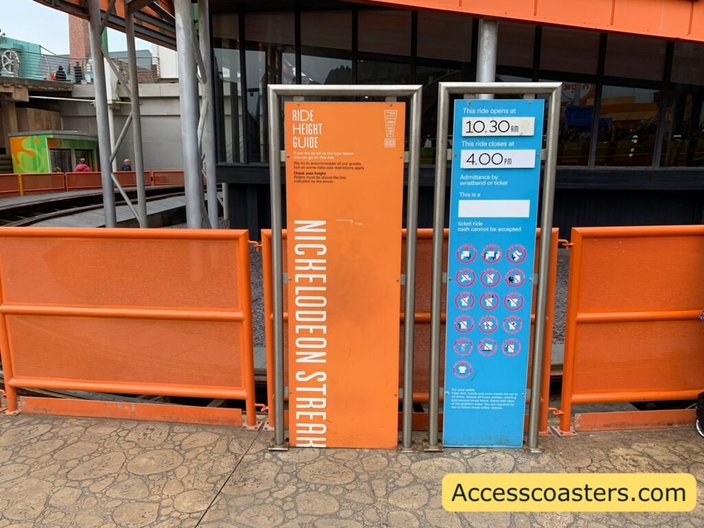 image shows ride information and restriction boards for Nickelodeon Streak information includes ride opening time and saft restriction like remain seated and no prams past this point. 