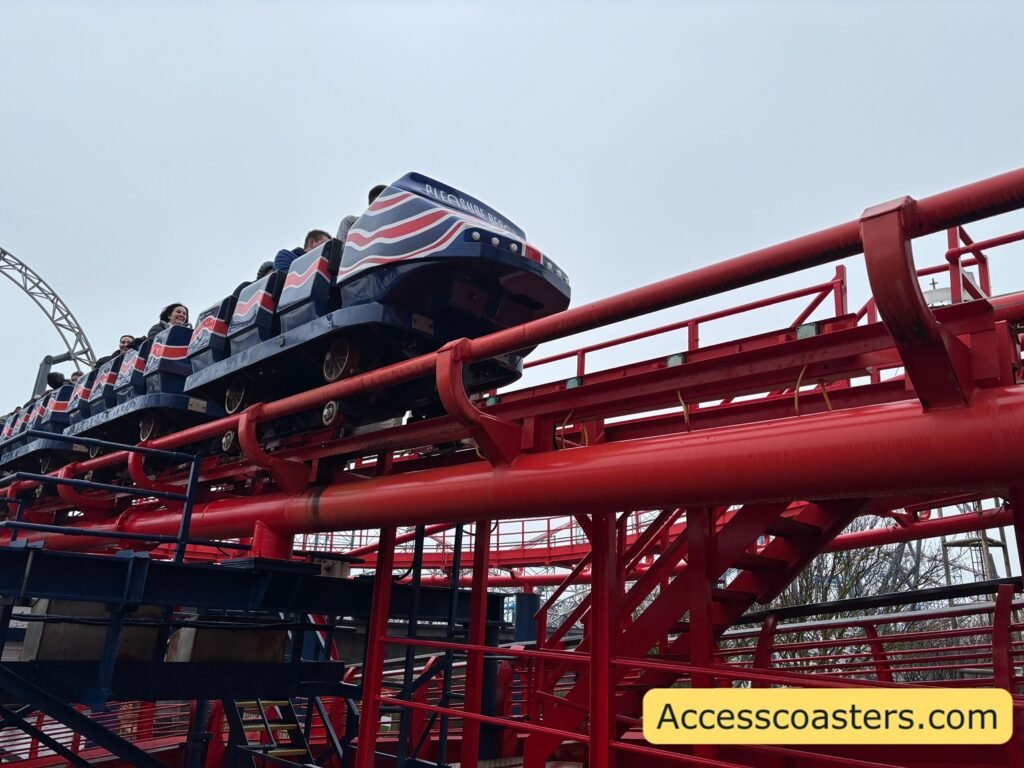 big one train on the break run the ride is blue with red stripes on a red track