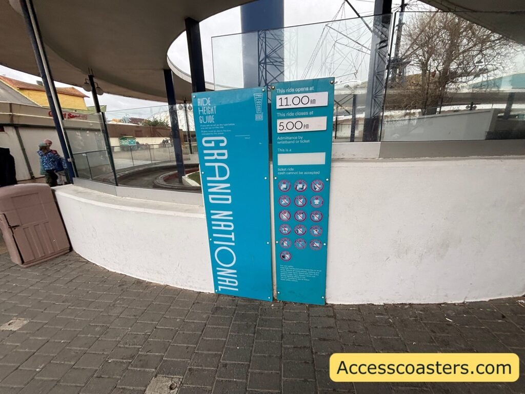 ride restriction board and height board for grand national with ride restrictions like no standing, no mobile phones.