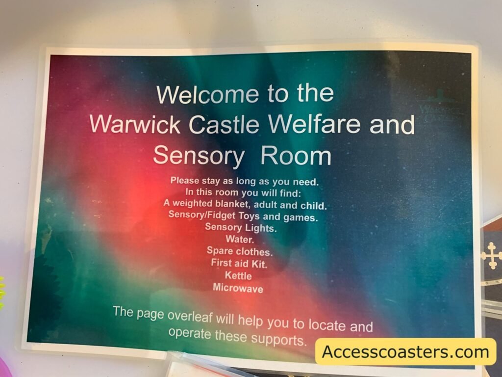 Welcome sign for the “Warwick Castle Welfare and Sensory Room” with a colourful gradient background, explaining that visitors can stay as long as needed and that information on how to use the supports is on the back.